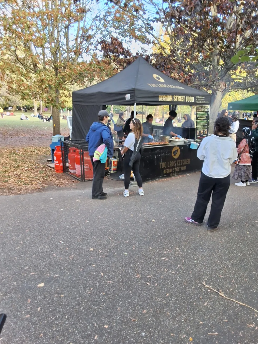 A black market gazebo and serving counter at Victoria Park Market